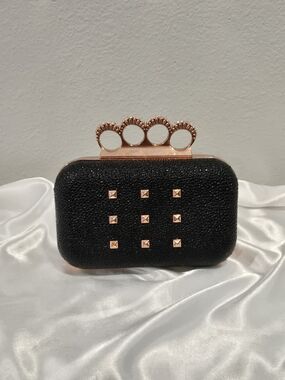 Rihanna Rogue Black Clutch with Rose Gold Knuckle Handle and Studs GWP